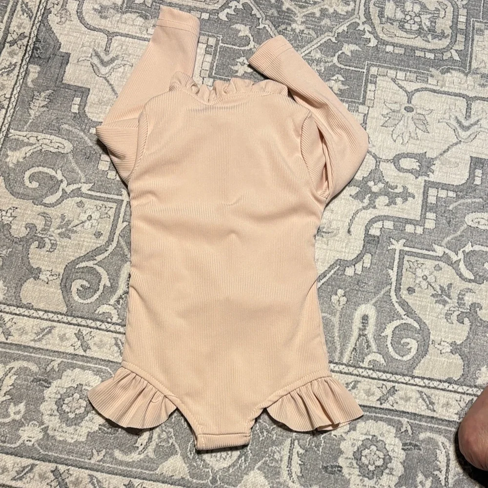 Ruffled cream color Kids One Piece swimsuit. Girls size 100